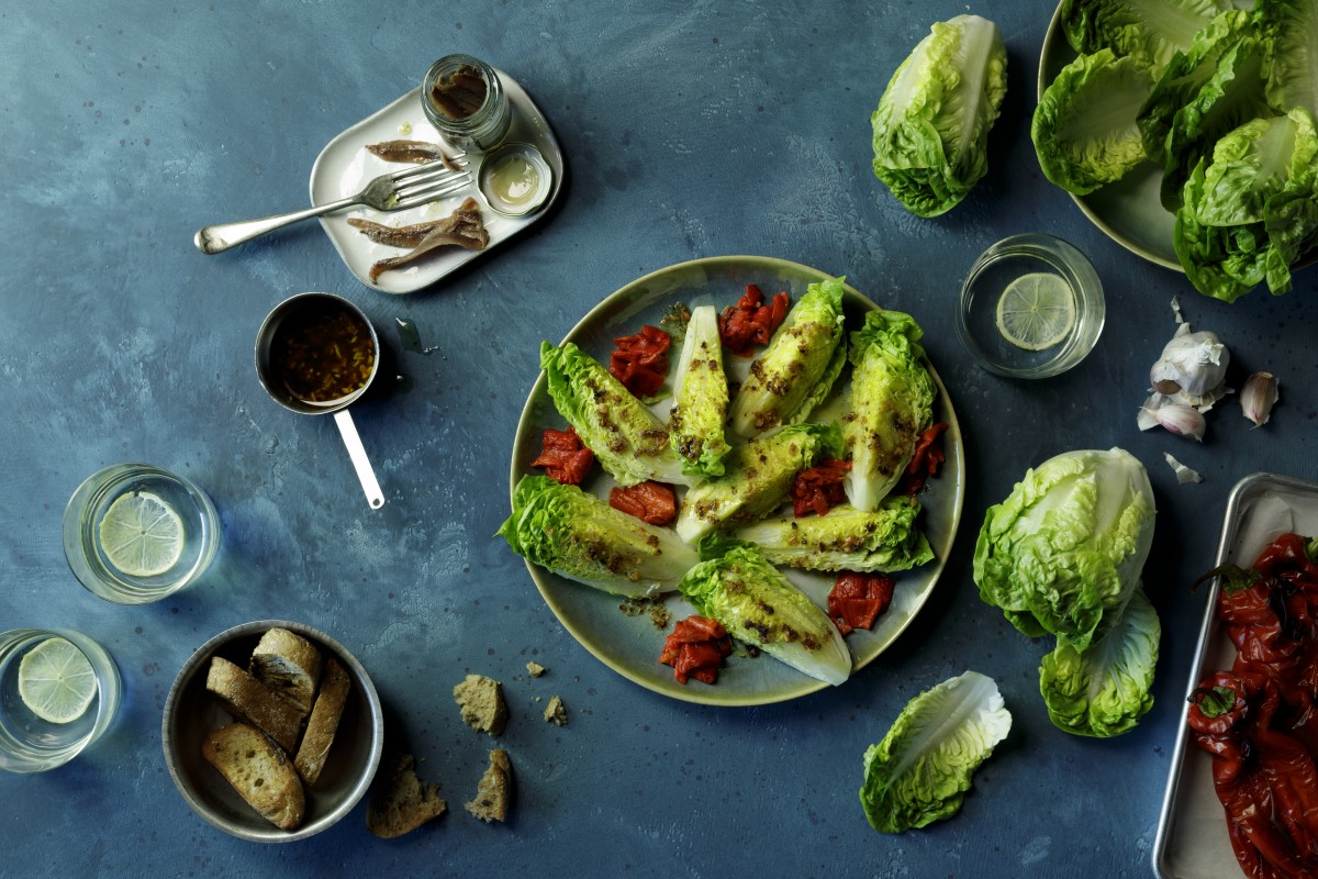 Baby gem hearts with roasted peppers and anchovy dressing