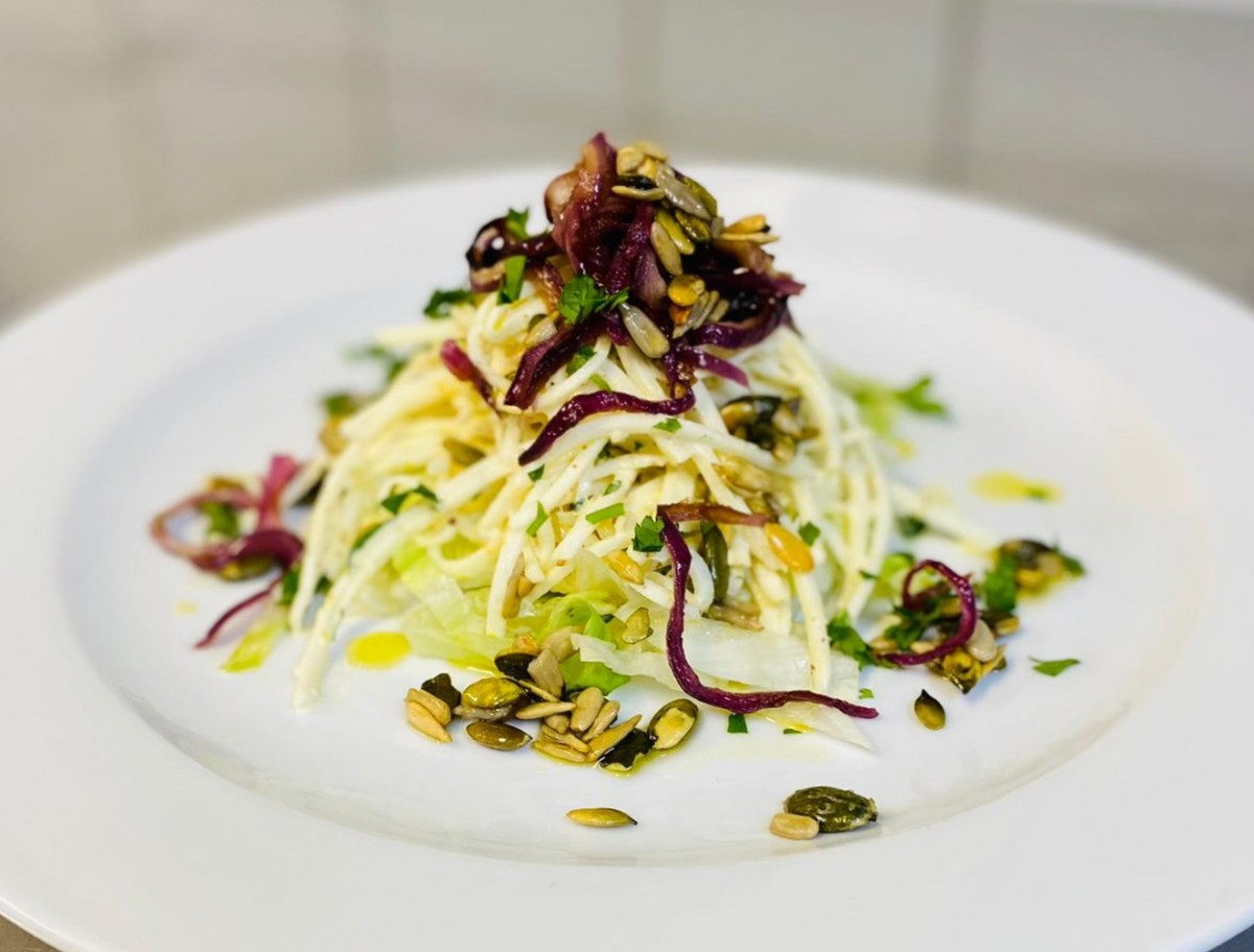 Celeriac salad with roasted onions and pumpkin seeds