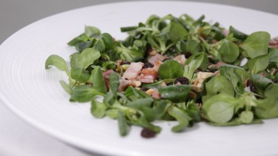 Bacon, lettuce and roasted nuts with a warm honey-mustard dressing