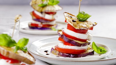 Grilled aubergine stacks with mozzarella and tomato 