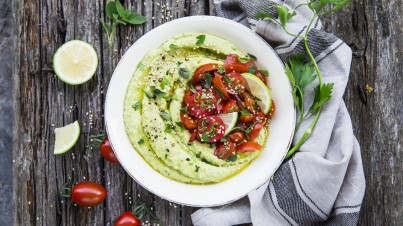 Avocado hummus with tomato salad