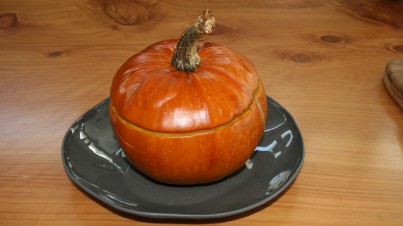 Baked pumpkin filled with eggplant and barley