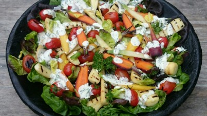 Salad with blistered tomatoes, baby butter leaves, carrot and parsnip