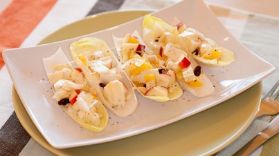 Chicory (Witlof) salad with oranges, apples and pine nuts