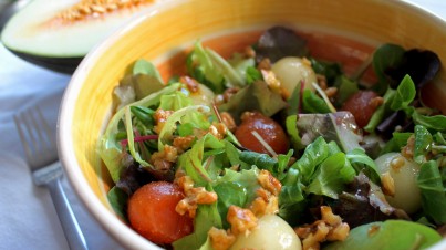 Coral lettuce salad with melon and quince balls