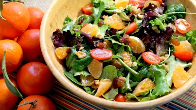 Mandarin salad with cherry tomatoes and nuts