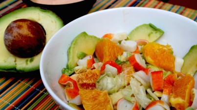 Tropical salad with avocado, orange and cos lettuce