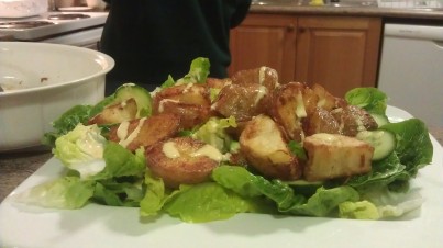 Roasted potato and crunchy cos salad with roast garlic aioli