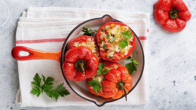 Vegetarian stuffed peppers with a garlic yogurt sauce