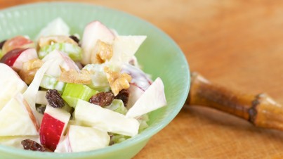 Frisse appelsalade met ananas en bleekselderij