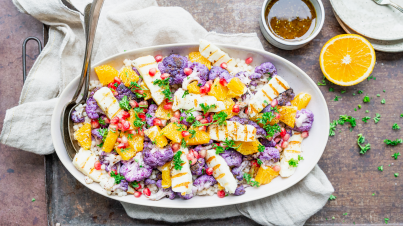 Grilled cauliflower with pearl couscous and a spicy dressing