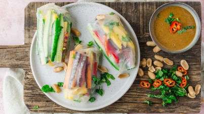 Rice paper rolls with cucumber and peanut sauce 