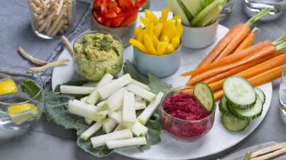 Vegetable snacks with avocado hummus and red beet caviar 