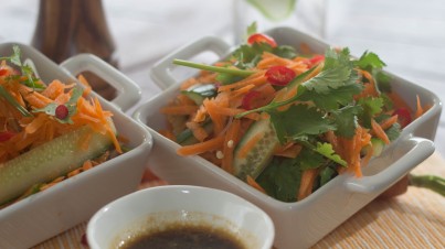 Spicy noodle salad with carrot, cucumber and coriander 