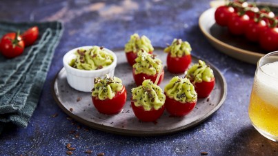 Cherry tomatoes stuffed with avocado cream