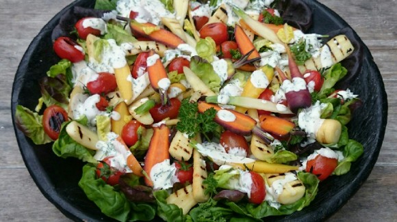 Salad with blistered tomatoes, baby butter leaves, carrot and parsnip