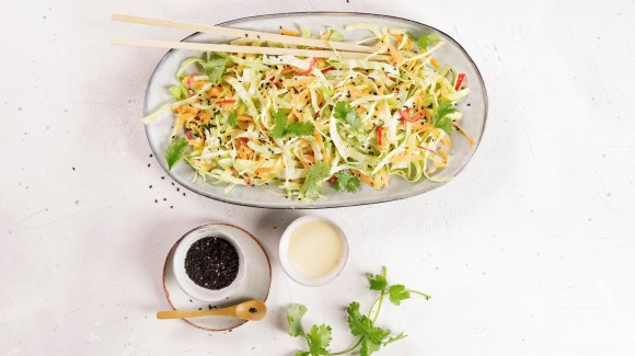 Asian pointed cabbage salad with carrots and chili peppers