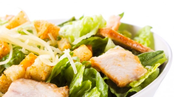 Caesar Salad with pan fried chicken, fresh shaved parmesan and croutons Caesar Salad with pan fried chicken, fresh shaved parmesan and croutons
