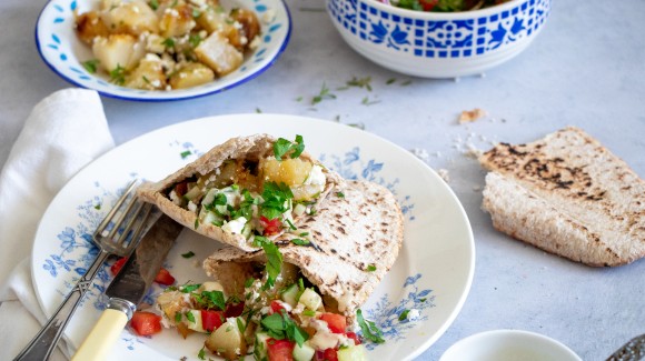 Roasted kohlrabi in a pita with Israeli salad