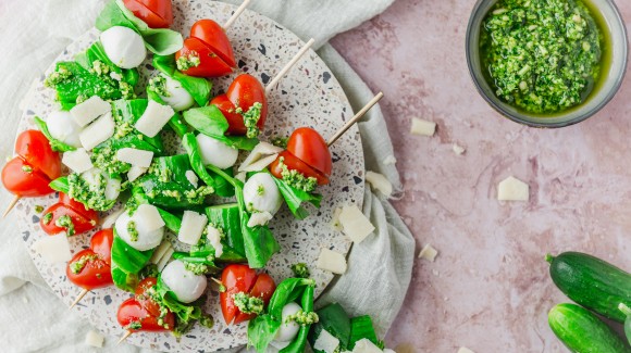 Caprese hearts with baby cucumbers and pesto