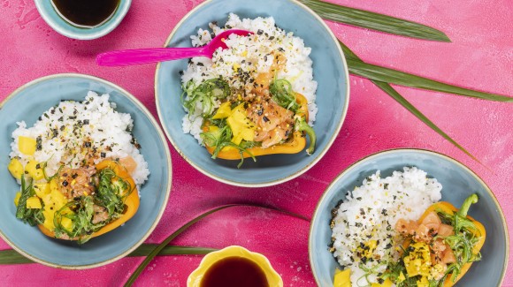 Poké bowl with salmon, mango, and pepper