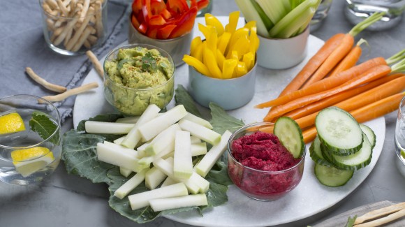 Vegetable snacks with avocado hummus and red beet caviar 