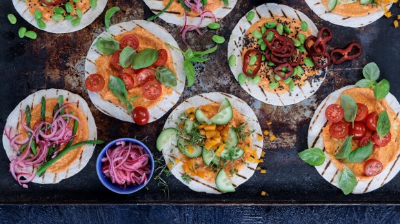 Wraps with vegetables and sweet pointed pepper spread