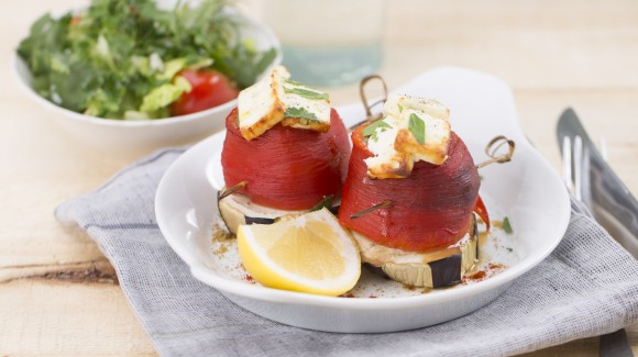 Baked sweet pointed peppers with minced lamb, aubergine and feta